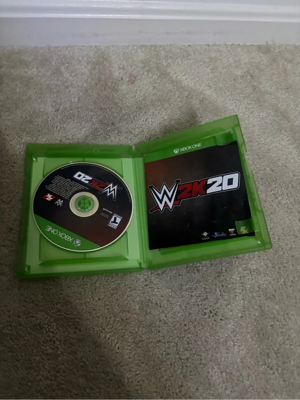 WWE 2K20 Xbox One Game - Green Case with Black and Red Cover